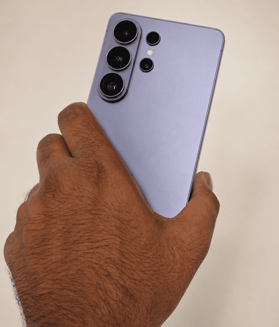 I used the Samsung Galaxy S26 Ultra for a month: Here’s my honest take 3 Man holding S26 Ultra with a back showing camera set up (1)