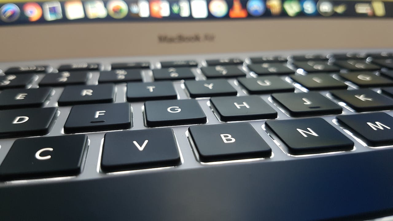 What to Do If You Spilled Water on a MacBook Keyboard 4 Absorb Liquid From the MacBook's Surface